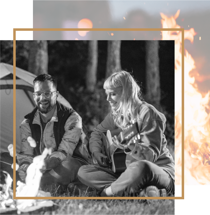 People gathered around a campfire representing storytelling, creativity, and connection at Firelight Creative Co.